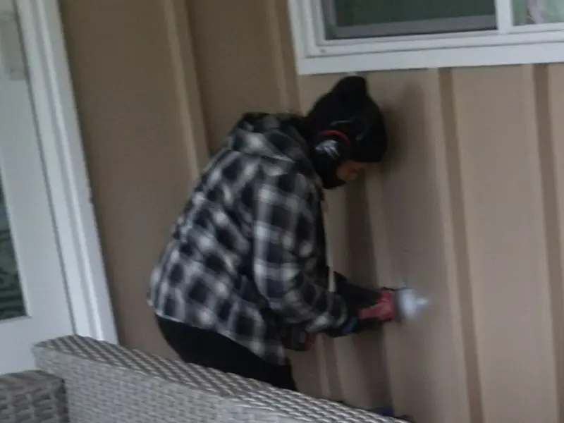 Professional electrician installing an exterior outlet in Coraopolis