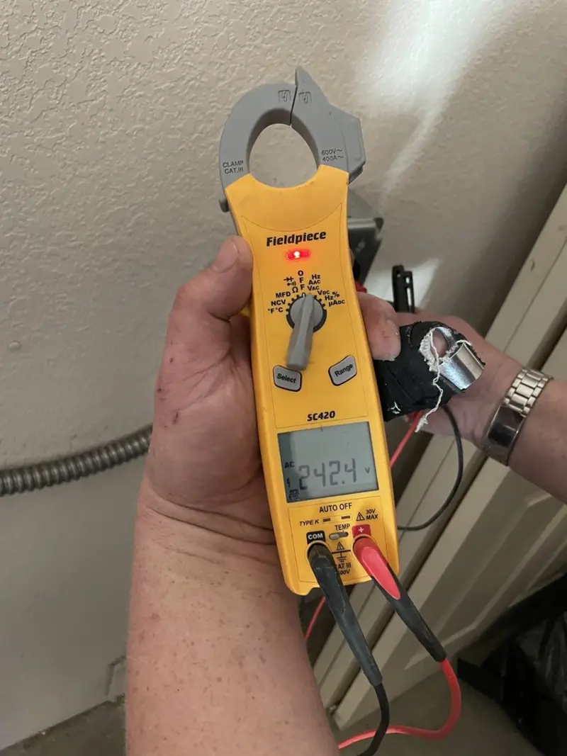 Voltage testing with clamp meter during Whole House Surge Protector in Coraopolis